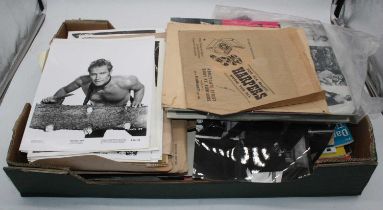 A box of miscellaneous entertainment related ephemera to include various press photos, a typed