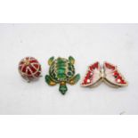A reproduction red enamelled and paste set ornamental trinket jar and cover in the form of a