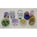 A collection of various glass paperweights (14)