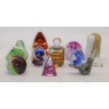 A collection of 13 various glass paperweights
