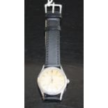 A gent's Girard-Perregaux Giromatic steel cased wristwatch, having signed champagne dial (