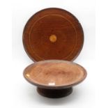 An early 20th century mahogany lazy Susan, having a circular revolving dish top, dia.38cm;