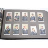 Two albums of vintage cigarette cards to include Wills