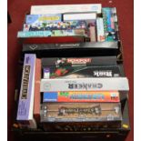 Two boxes of assorted board games and toys, to include Monopoly, Risk, Chancer, Labyrinth, and A