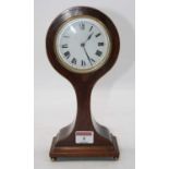 An Edwardian mahogany and chequer strung balloon shaped mantel clock, the circular enamel dial