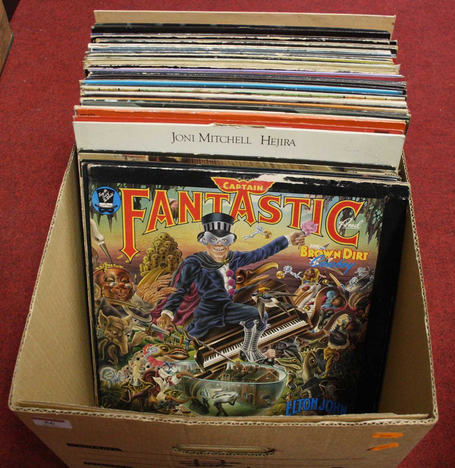 A box of assorted LPs, to include Elton John - Captain Fantastic and The Brown Dirt Cowboy,