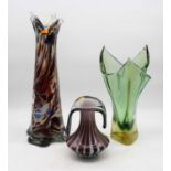 A large Murano style glass vase, the pinched rim to a conical body, with red, orange and green