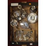 A box of silver plated wares, to include table candlesticks, teapot, coffee pot, flatware etc