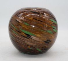 An art glass vase of globular form with swirling glitter inclusions, height 18cm