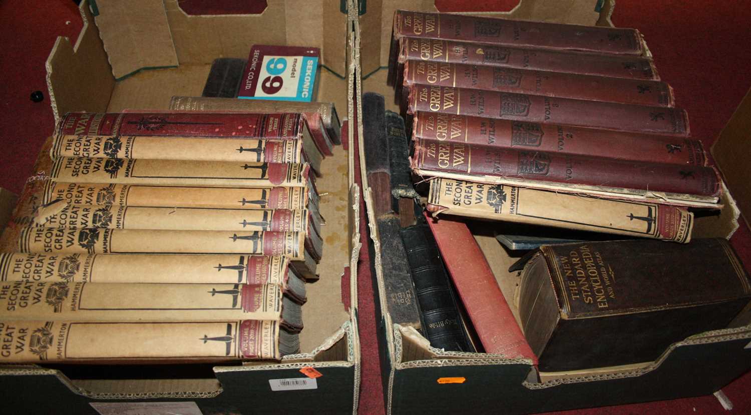 Two boxes of books mainly relating to the World Wars; together with two prints