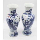 A pair of Chinese export blue and white vases, of baluster form, underglaze blue decorated with