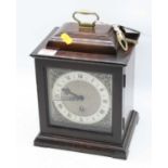 A mid-20th century walnut cased bracket clock, in the 18th century style, having a silvered