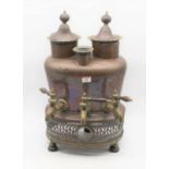 An early 20th century commercial brass and copper double-samovar, of shaped oval form, having