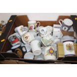 A collection of Royal commemorative mugs