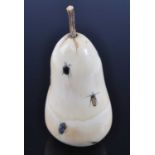 A Japanese Meiji (1868-1912) shibayama ivory okimono, carved as a pear with applied insect
