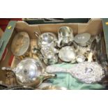 A box of silver and silver plated wares, to include a repousse decorated silver-backed dressing