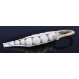 A Japanese Meiji (1868-1912) shibayama ivory okimono, carved as a partially open pea pod with