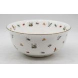 A Present Company of England fruit bowl, on a white ground decorated with butterflies, bees and