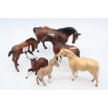 A collection of five Beswick models of horses, the largest h.14cm; together with a Beswick model