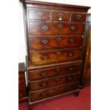 A George III mahogany chest on chest, the upper section with three short over three long graduated