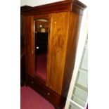 An Edwardian mahogany chequer strung and floral polychrome decorated single mirror door wardrobe,