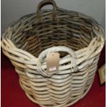 A 'country house' wicker twin handled log basket, dia.75cm