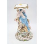 A 20th century Dresden porcelain centrepiece base, the oval top supported by two semi-nude maidens