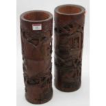 A pair of Japanese bamboo brush pots relief carved with various figures and flowers, height 36cm