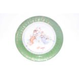 A large Continental porcelain signed charger, the centre printed with The Three Graces within a