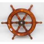 A reproduction miniature hardwood ships wheel, dia. 47cm