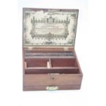 An early 20th century mahogany artists box, the hinged lid with printed label to the underside for