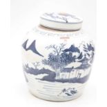 A Chinese style blue & white ginger jar of squat baluster form, underglaze blue decorated with