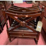 A contemporary mahogany four division canterbury, with single lower drawer, width 46cm