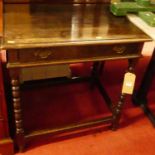 An antique joined oak bobbin turned single drawer side table, w.73cm
