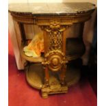 A circa 1900 French black variegated marble topped and giltwood three-tier side table, in the
