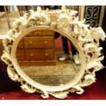 A contemporary profusely floral decorated white painted circular bevelled wall mirror, dia.110cm