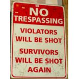 A reproduction printed metal advertising sign 'No Trespassing', 70 x 50cm