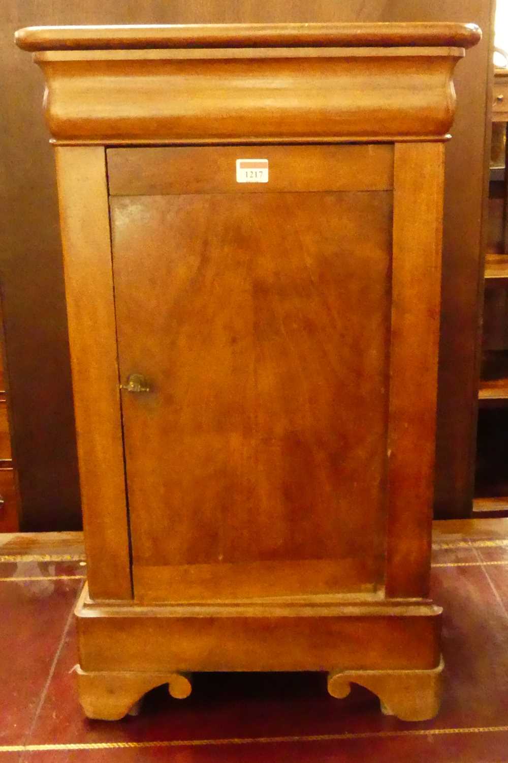 A 19th century French round cornered single door bedside cupboard, with single upper drawer, w.45cm
