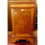 A 19th century French round cornered single door bedside cupboard, with single upper drawer, w.45cm