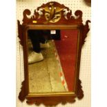 A circa 1900 mahogany Chippendale style fret cut rectangular wall mirror, 80.5 x 51cmSome losses