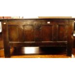 An 18th century provincial joined oak four panelled hinge-top blanket chest, w.107.5cm