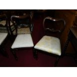 A pair of Victorian rosewood balloon back chairs, together with a similar further pair (4)