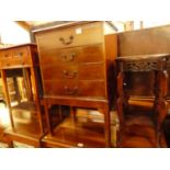 An Edwardian mahogany four drawer music chest; together with a reproduction yew wood occasional