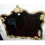 A floral gilt decorated shaped wall mirror in the French taste, 70.5 x 74.5cm