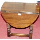 A small joined oak drop flap top occasional table, on ring turned supports, width 49cm