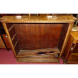 A Victorian figured walnut freestanding open bookshelf, having knopped upper edge, with adjustable