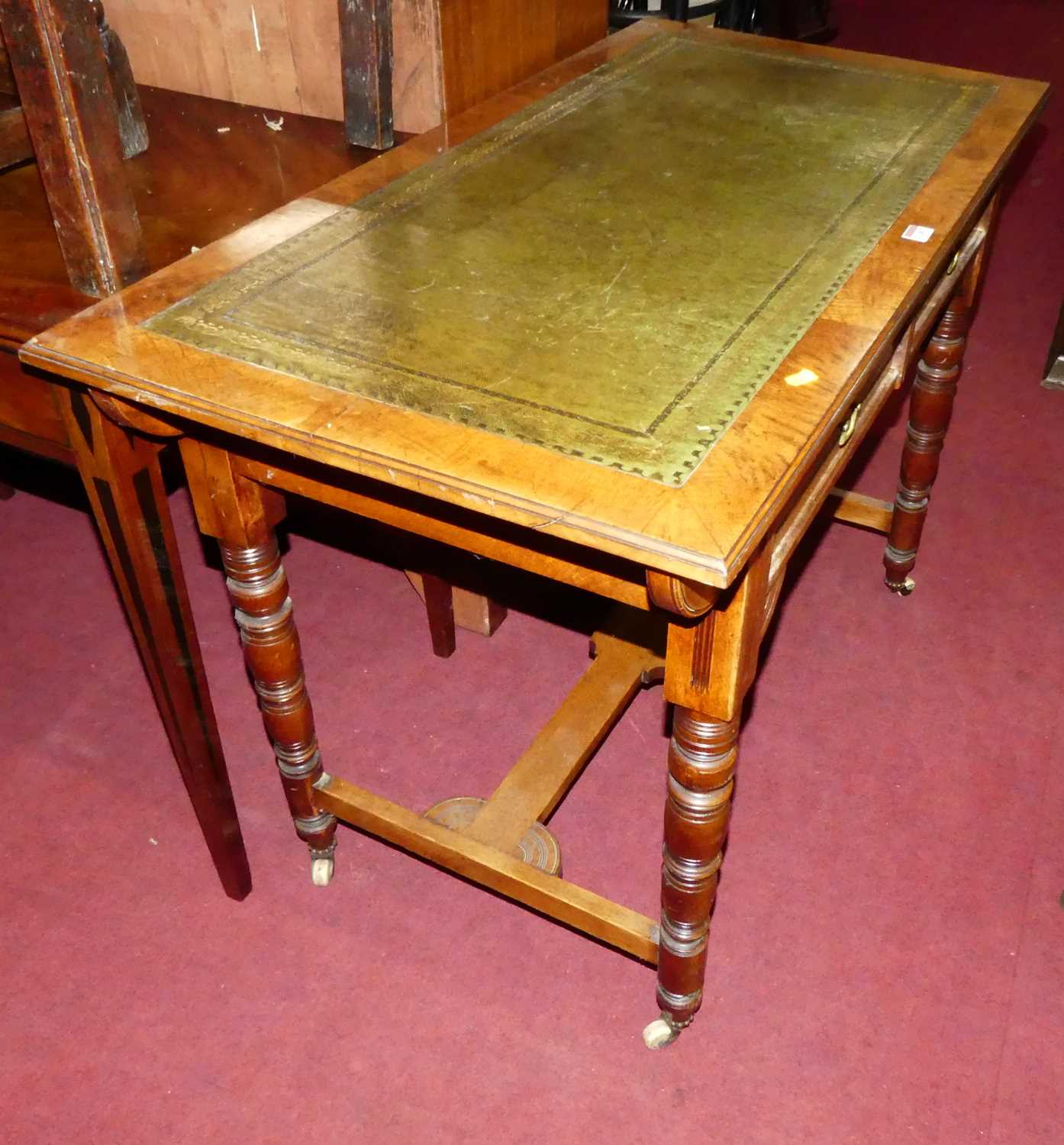 A Victorian Aesthetic Movement oak and burr oak two drawer writing table, having a gilt tooled green - Image 5 of 5