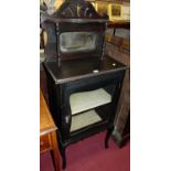 An Edwardian stained beech mirrorback single door glazed music cabinet, w.55.5cm