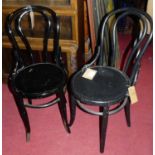 A set of six black painted panelled seat bentwood café chairs