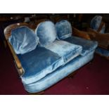 A 1930s figured walnut and split cane inset three piece Bergere suite, comprising; three-seater